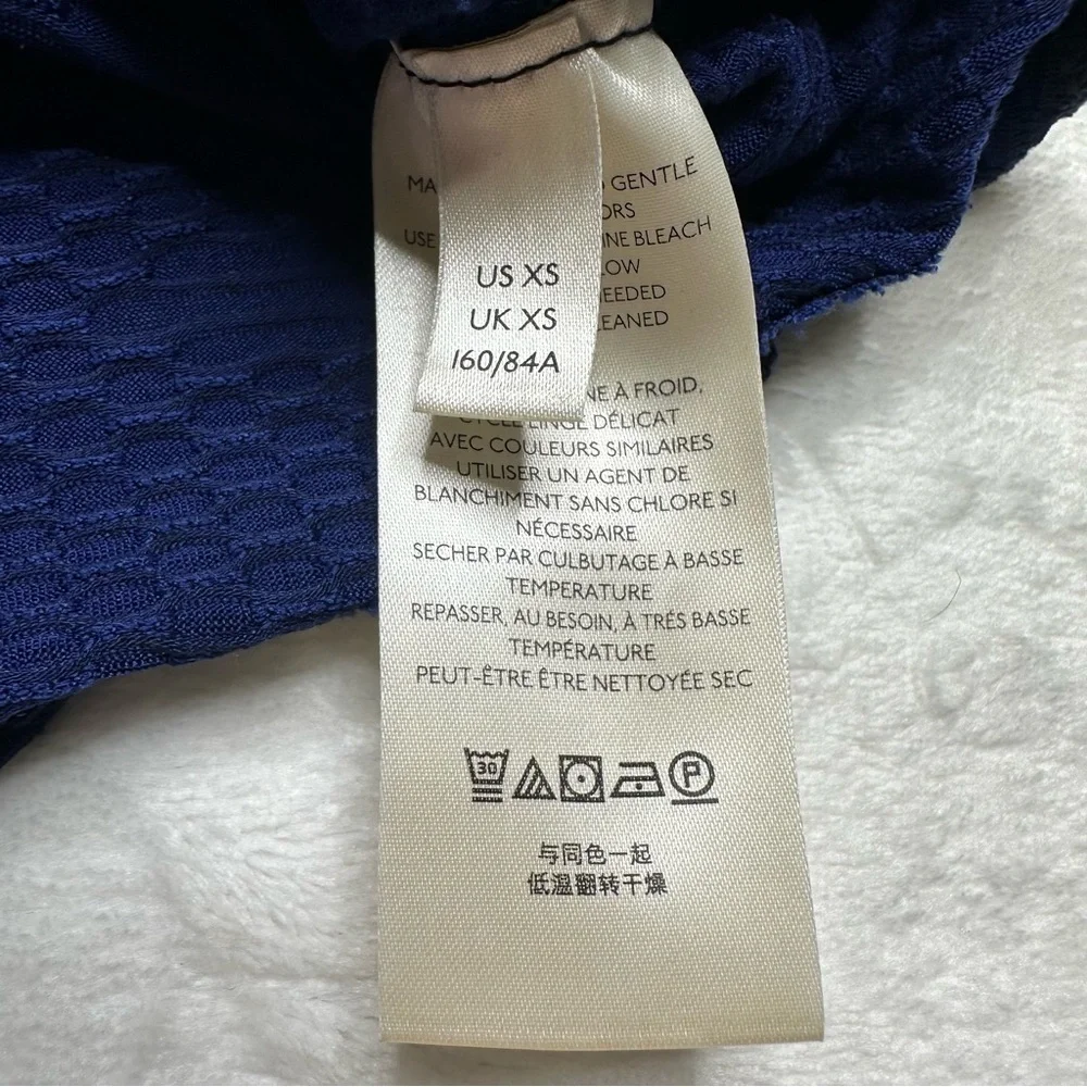 Free People Penny Plunge Neckline Wrap Long Sleeve Stretch Top in Navy Ink NWT